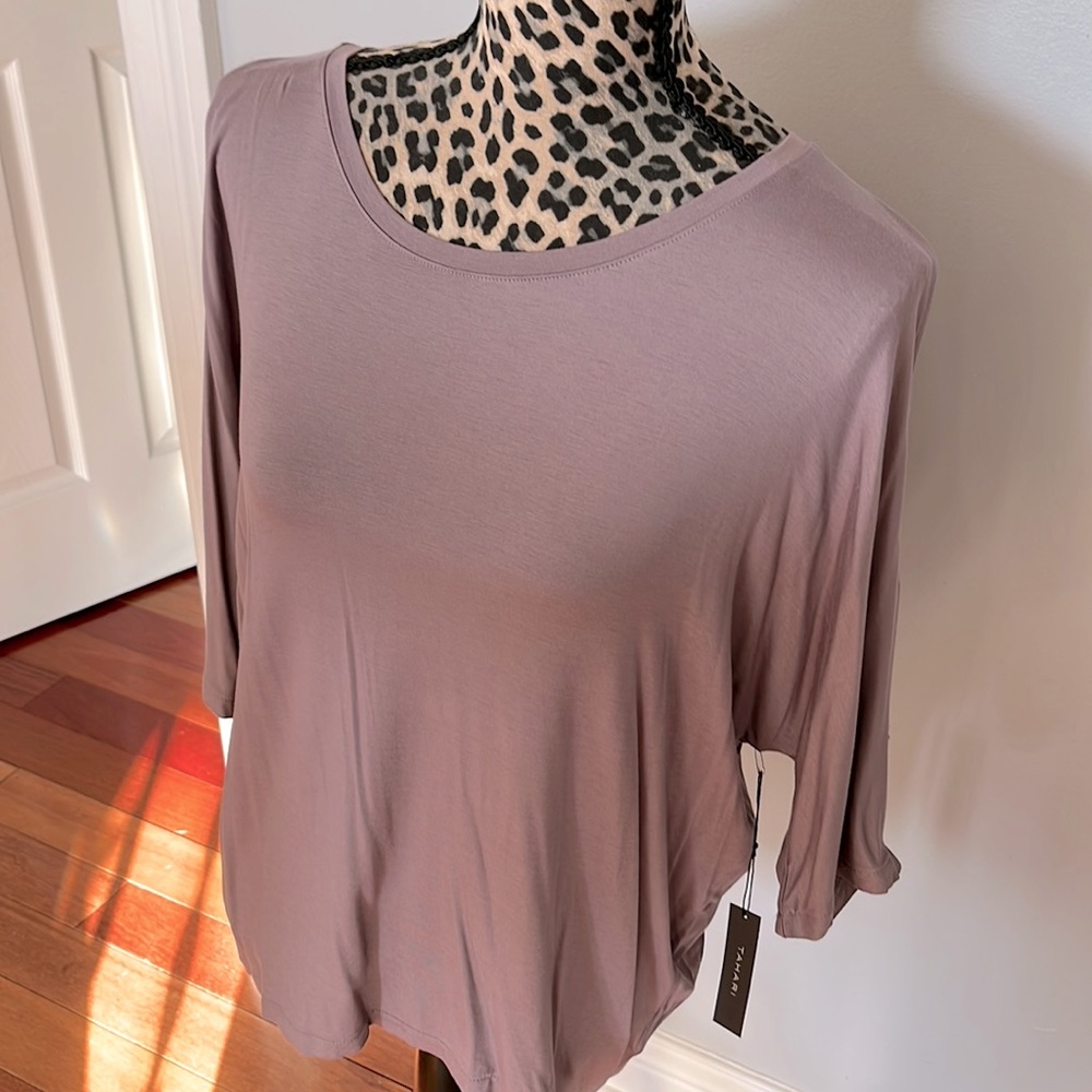 Dolman style adorable buttery Top Size M with vented sleeves. Never worn